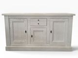 a white wooden sideboard with two drawers and two doors