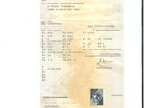 une image d'un document sur lequel figure la photo d'un homme