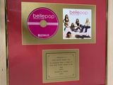 a framed picture of a cd and cd on the wall