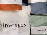 many different types of pillows and pillows on display
