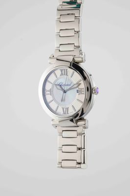 an image of a close up of a wrist watch on a white background