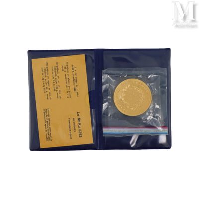 an image of a gold coin is in a plastic bag