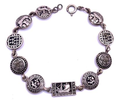 a close up of a bracelet on a white background