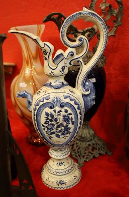 many vases that are sitting on a red table