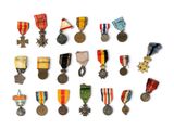a lot of medals on a white surface
