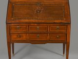 an old wooden desk with drawers and drawers on top of it