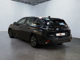 a black car that is parked in a room