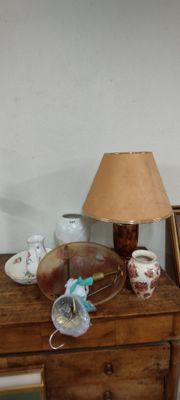 a small table with a lamp on top of it