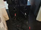 a lot of speakers that are sitting on a table