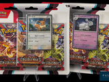 three packs of pokemon cards are in a package on a black background