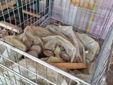 a shopping cart full of stuff in a warehouse
