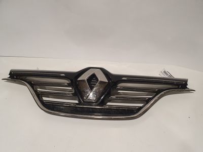 a close up of a car emblem on a white surface