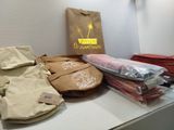 a table with many bags of food on it
