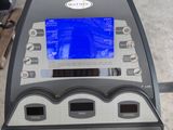 an image of a close up of a tread machine in a gym