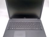 the dell laptop is open and ready to be used