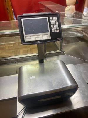 une photo d'une caisse enregistreuse dans un magasin
