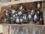 a box full of pots and pans sitting on the floor