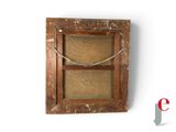 a picture of an old window with a rope hanging from it