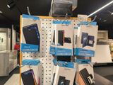 a lot of cell phones on display in the store