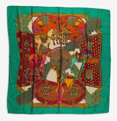 an image of a green scarf with a picture of a horse on it