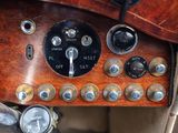a close up of the dashboard of a vintage car