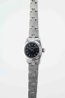 a close up of a wrist watch with a black dial