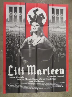 an old movie poster of a woman in a nazi hat