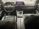 the interior of a car with a dashboard and a steering wheel