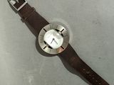a watch that is laying on a table