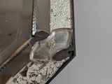 a close up of a metal object on a window sill