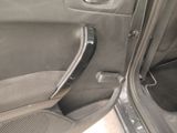 a car door handle that has been removed from the inside