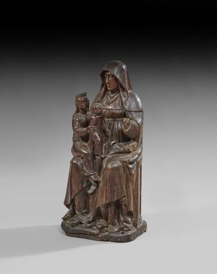 a bronze statue of a woman and two children