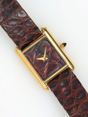Harry WINSTON. Montre en or dans le goût de la "Tank de Cart…