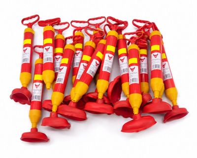 six red and yellow fire extinguisors are lined up on a white surface