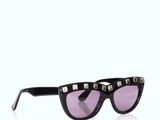 black cat eye sunglasses with silver studs and purple lenses
