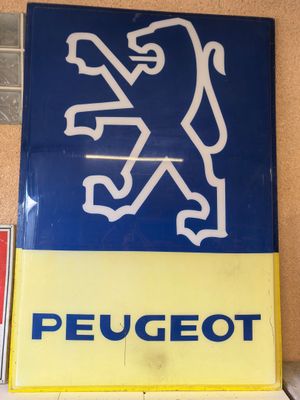 a blue and yellow sign that says peugeot on it