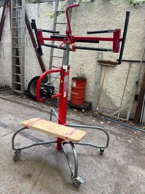 a small cart that is sitting on the sidewalk