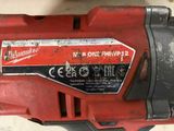 the milwaukeer drill is sitting on a table with a red handle