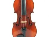 a violin that is sitting on a white surface