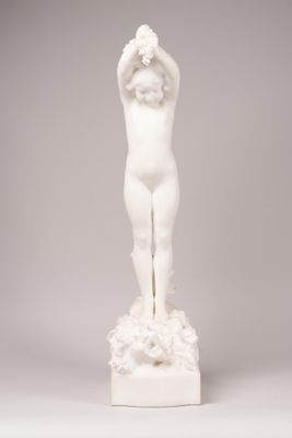an image of a statue of a woman holding a flower in her hands