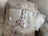 a pile of bags that have been wrapped in plastic