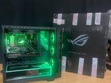 a computer case with a green light inside of it