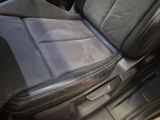 a black seat in the back of a car
