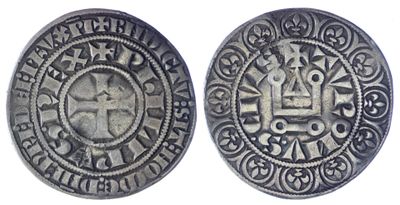 une pièce de monnaie en argent portant l'image d'une croix