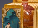 a small box with a picture of a naked woman inside of it