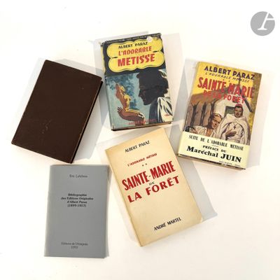 three books that are sitting on a table