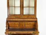 an image of a wooden dresser with a mirror on top of it
