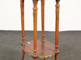 an image of a small wooden table with a metal tray on top