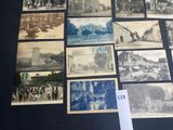 many old photographs of people and buildings on the table