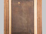 an old picture frame with a brown background and a black background